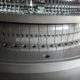 Central stitch control system for single jersey circular knitting machine